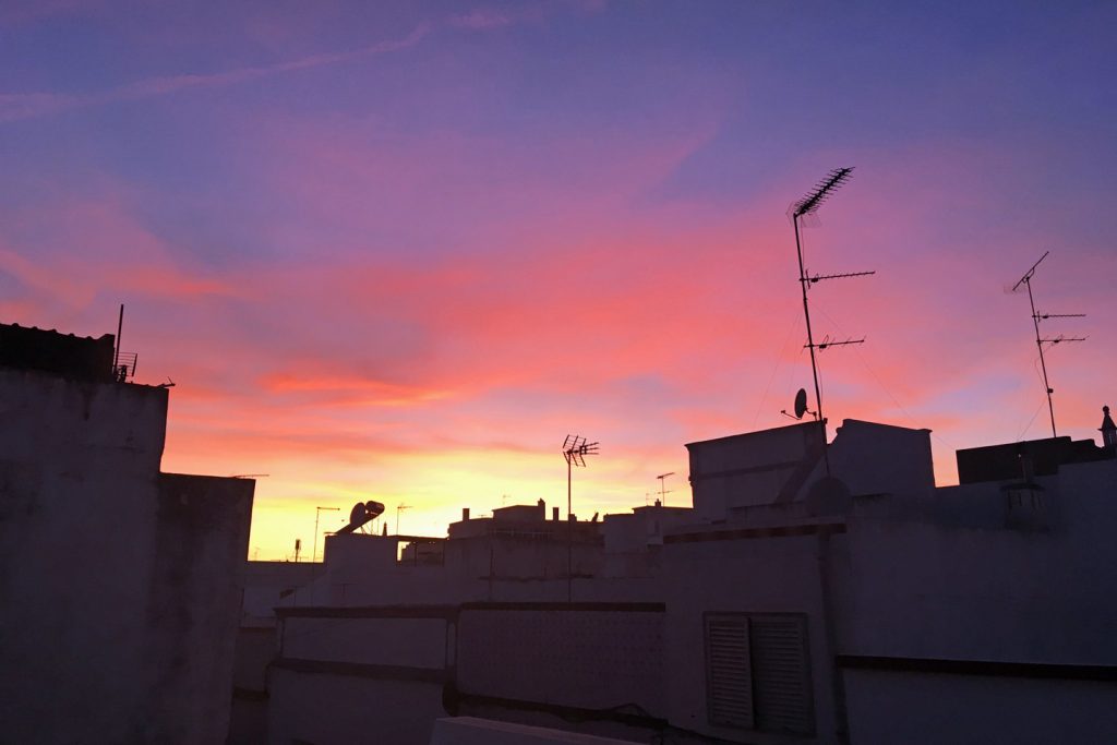 A Photo of a glorious sunset over the roof terraces of Olhao