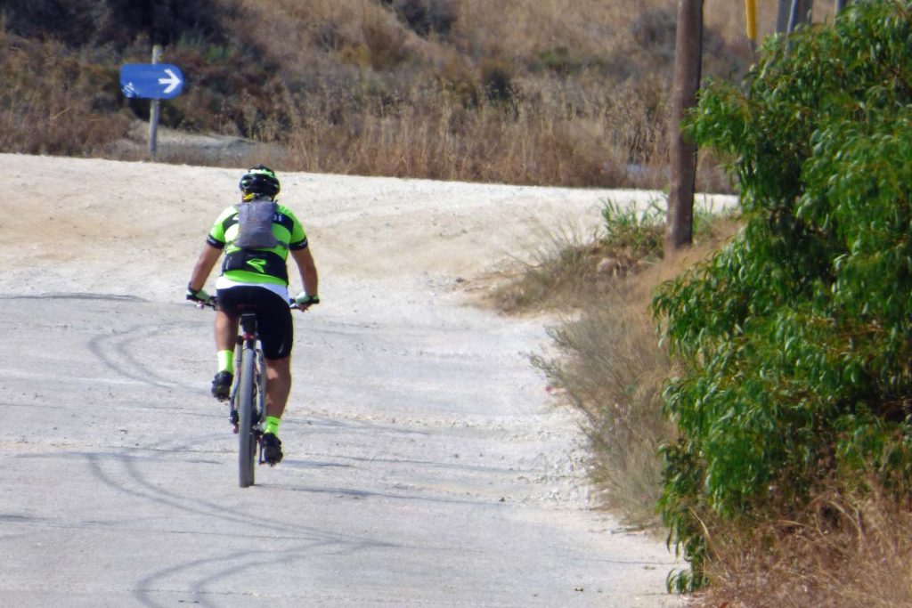 A photo of a cyclist on the Ecovia Litoral in the Algarve