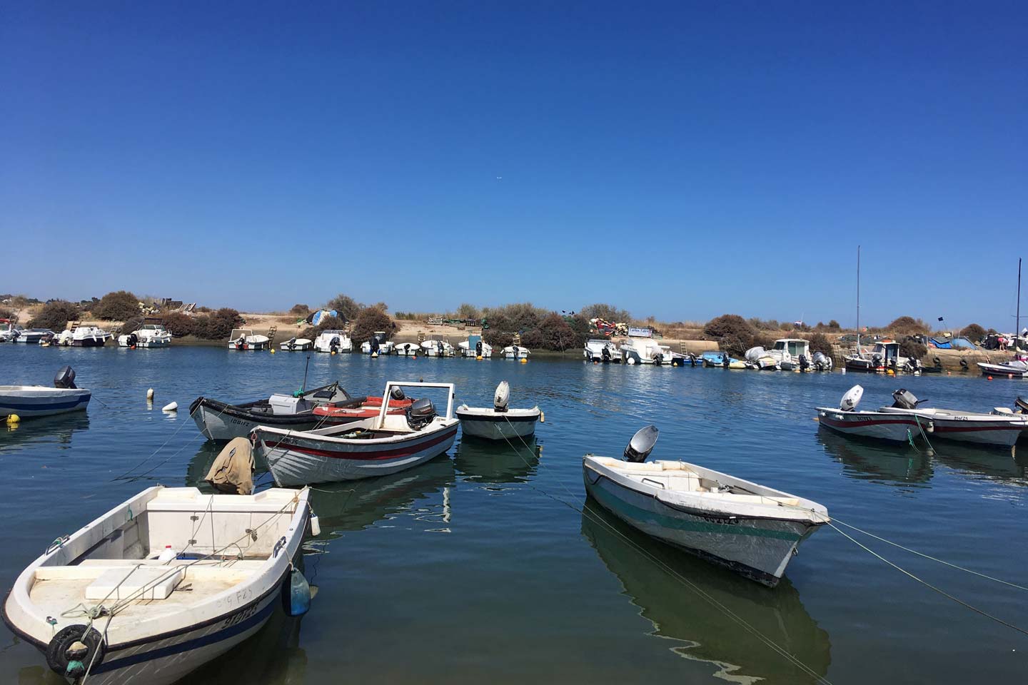 A photo of small boats on the water in Fuseta
