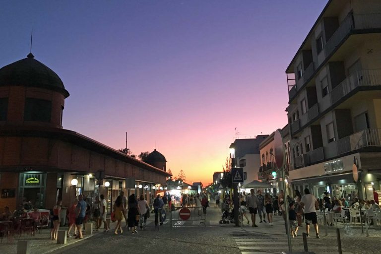 A photo of the fish market building in Olhao at sunset