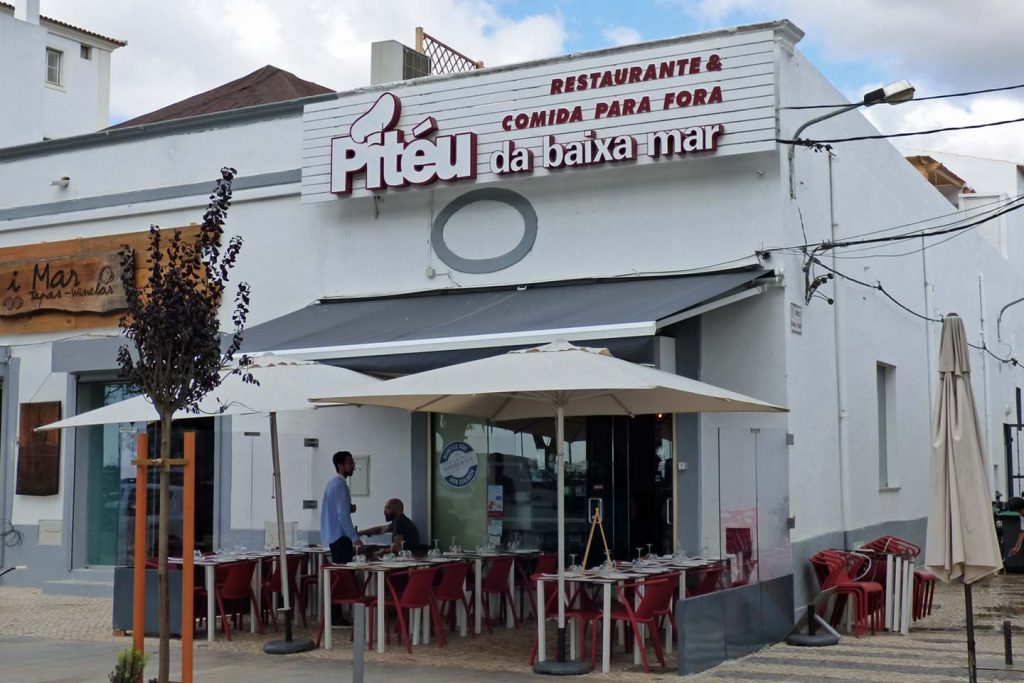 An outside view of Piteu restaurant on the waterfront in Olhao