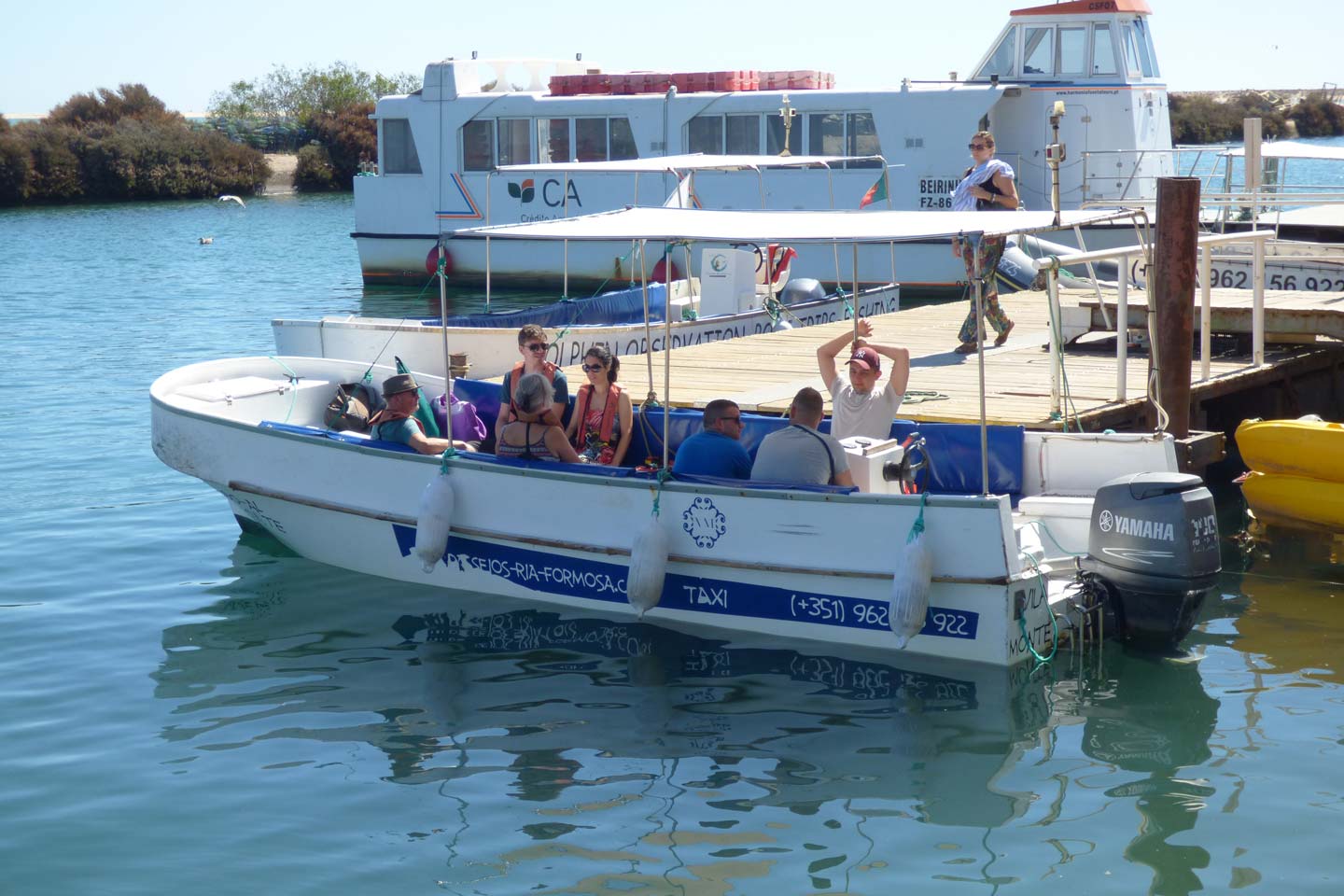 A photo of a water taxi at the quayside in Fuseta