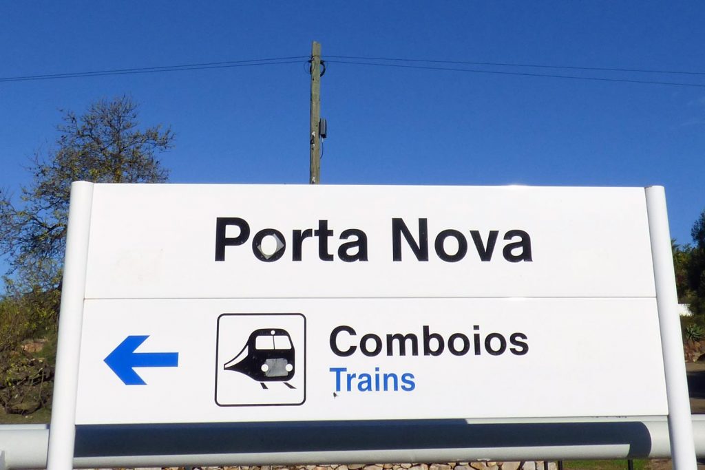A photo of the sign showing the name of the station at Porta Nova