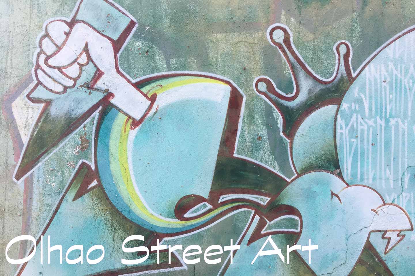 A Photo of Olhao Street Art - turquoise shapes