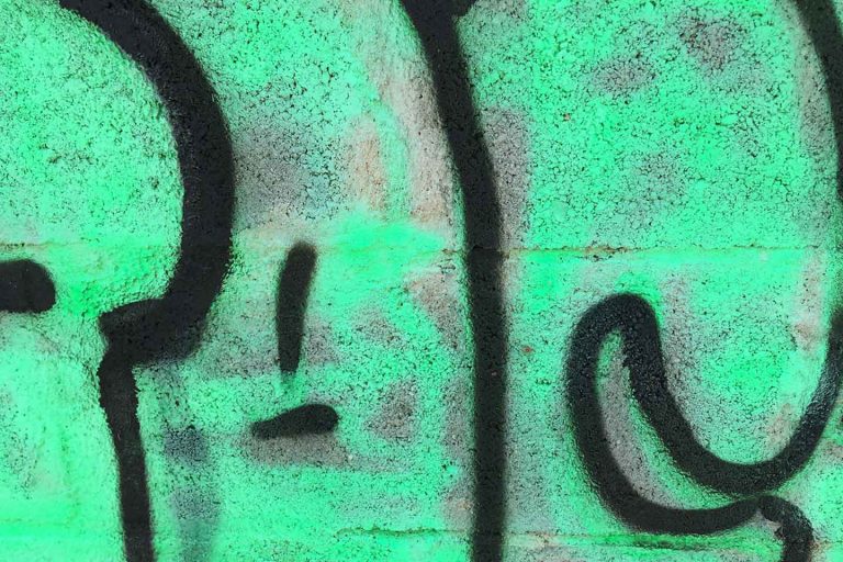 Olhao Street Art - luminous green lettering