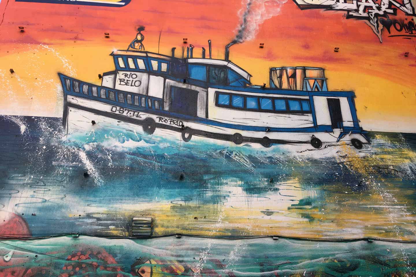 Olhao Street Art - a boat on the high seas