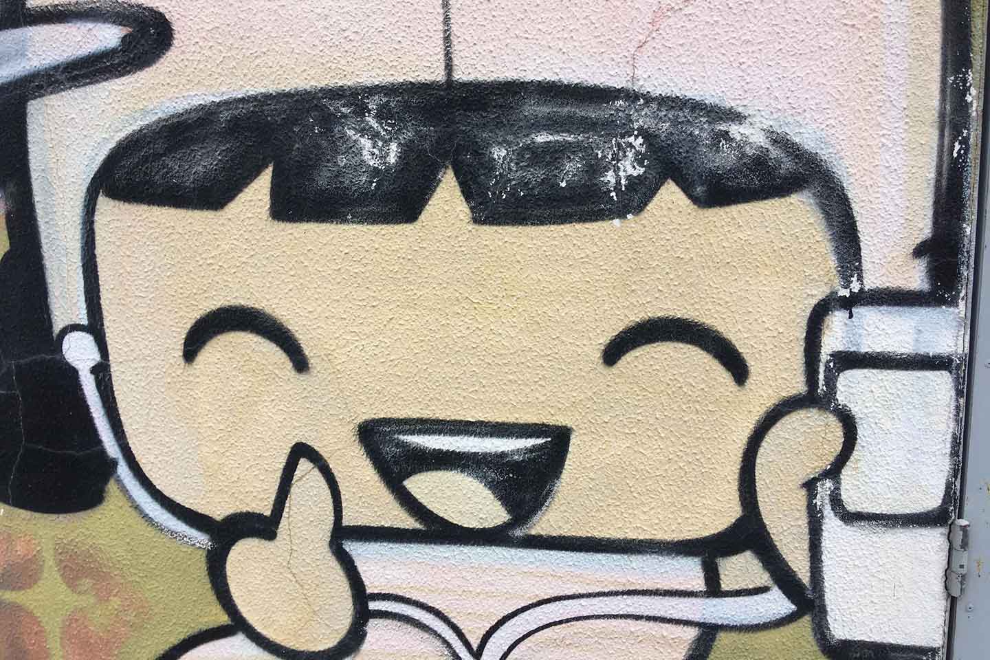 Olhao Street Art - face of a little girl