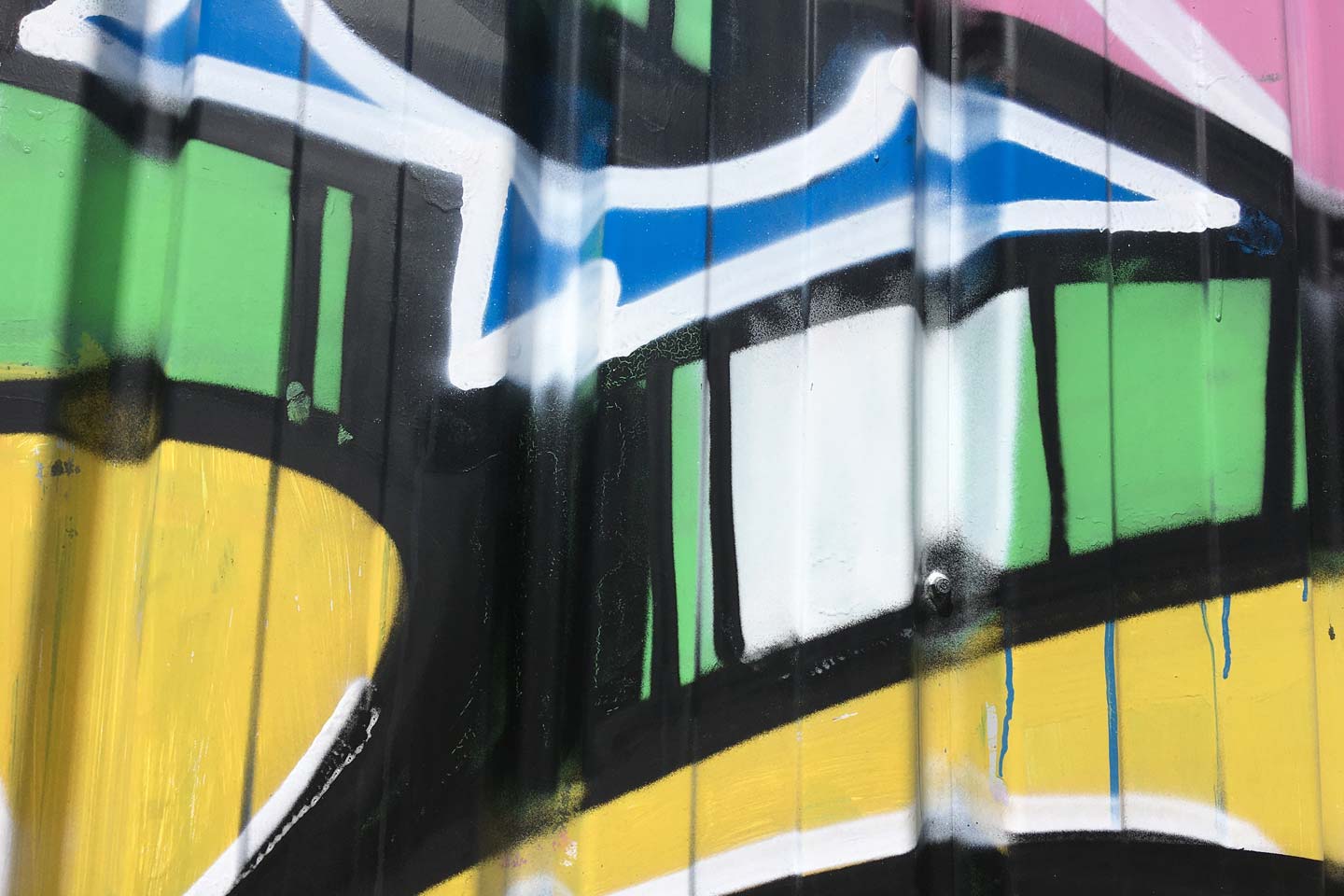 Olhao Street Art - green, yellow, blue and black shapes